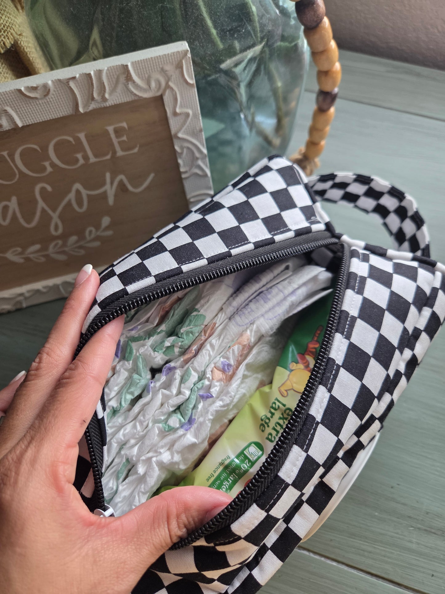 Black and white checkered diaper and wipe pouch