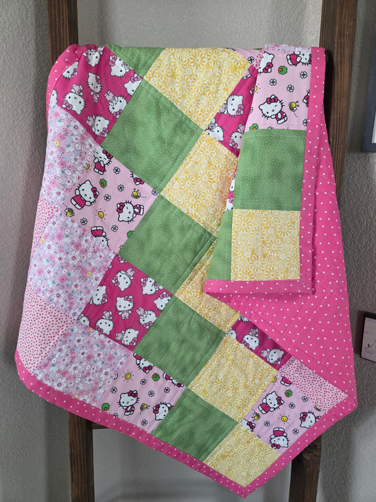 Hello Kitty theme baby/toddler quilt.
